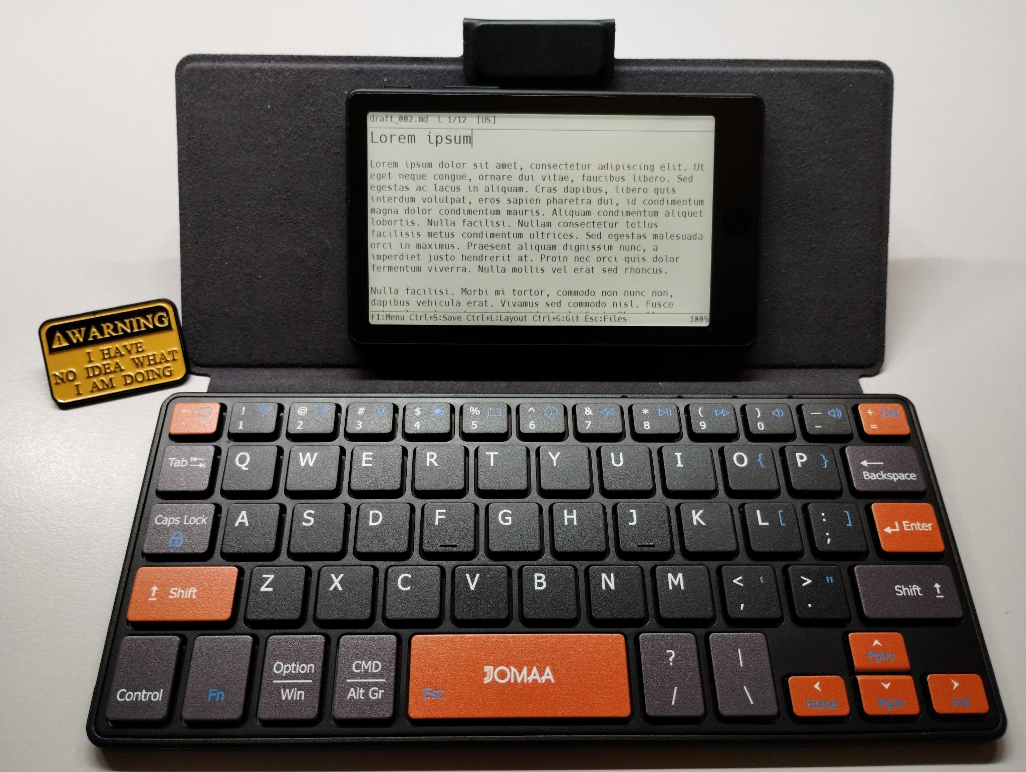 Xteink X4 Pro running Draftling, with a Jomaa KB231 keyboard